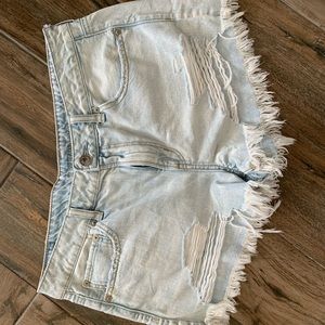 Distressed light wash jean shorts